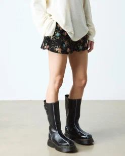 Buzz Hi Gloss Leather Boots in Black